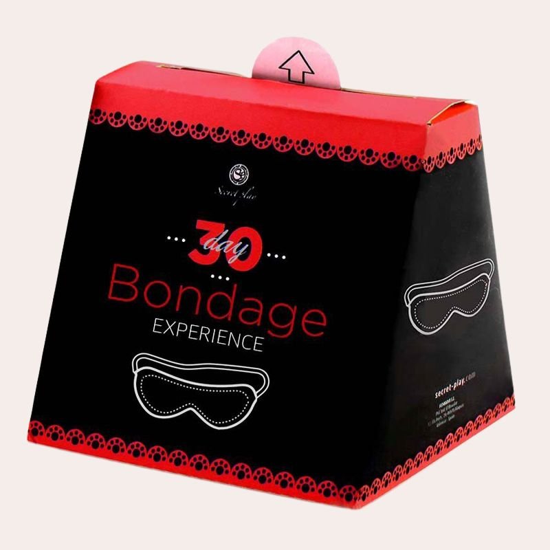 30 défis bondage progressifs pour couples. Explorez la contrainte, la confiance et le désir avec le jeu Secret Play.